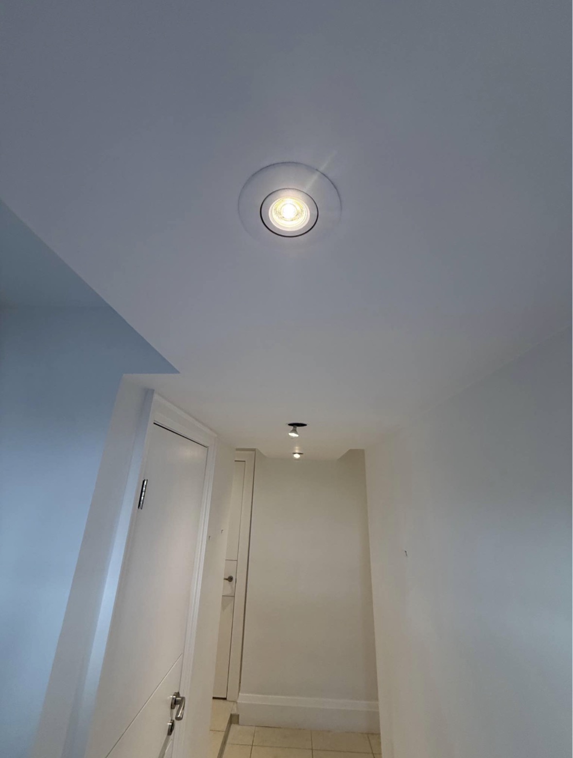 Finished ceiling repair in a hallway
