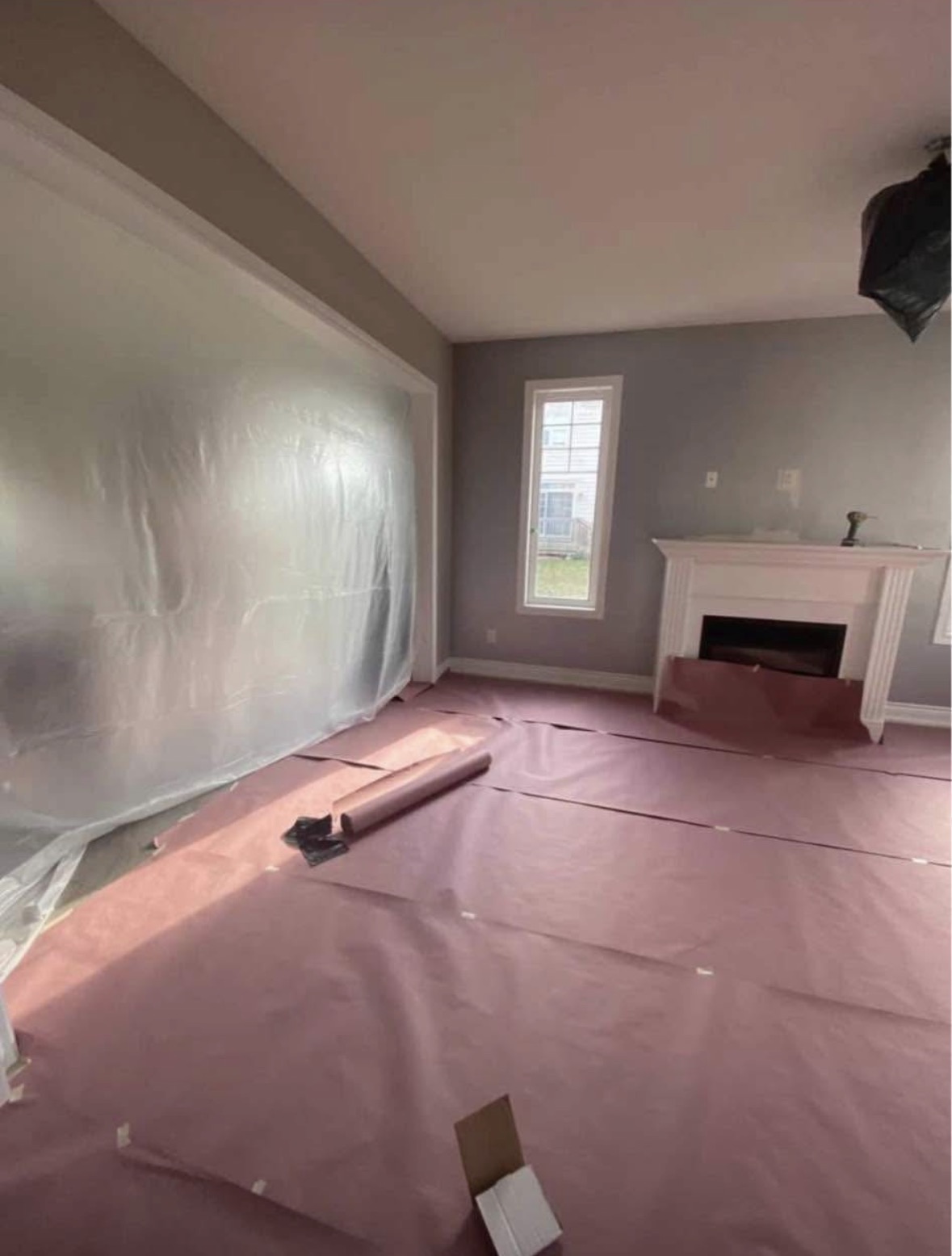 Protected room prepped for drywall work
