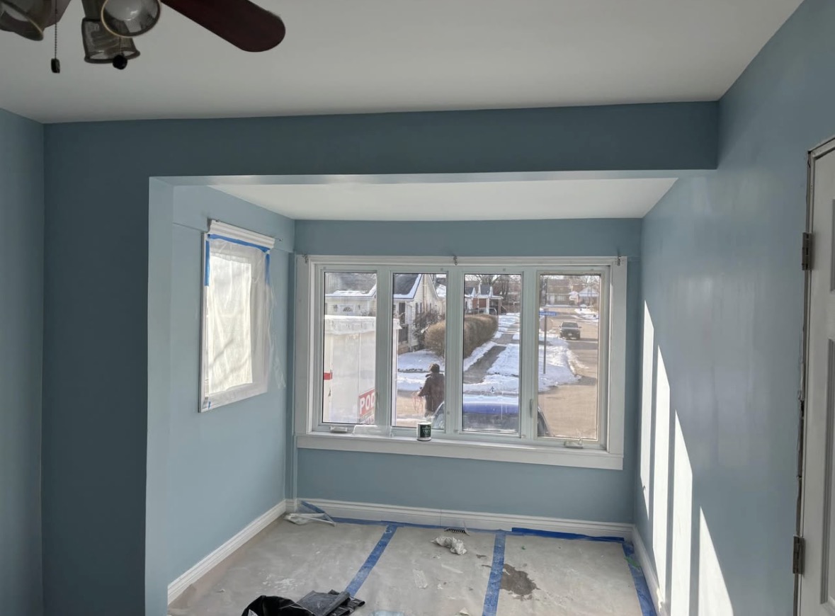 Finished room with clean drywall lines and paint-ready surfaces